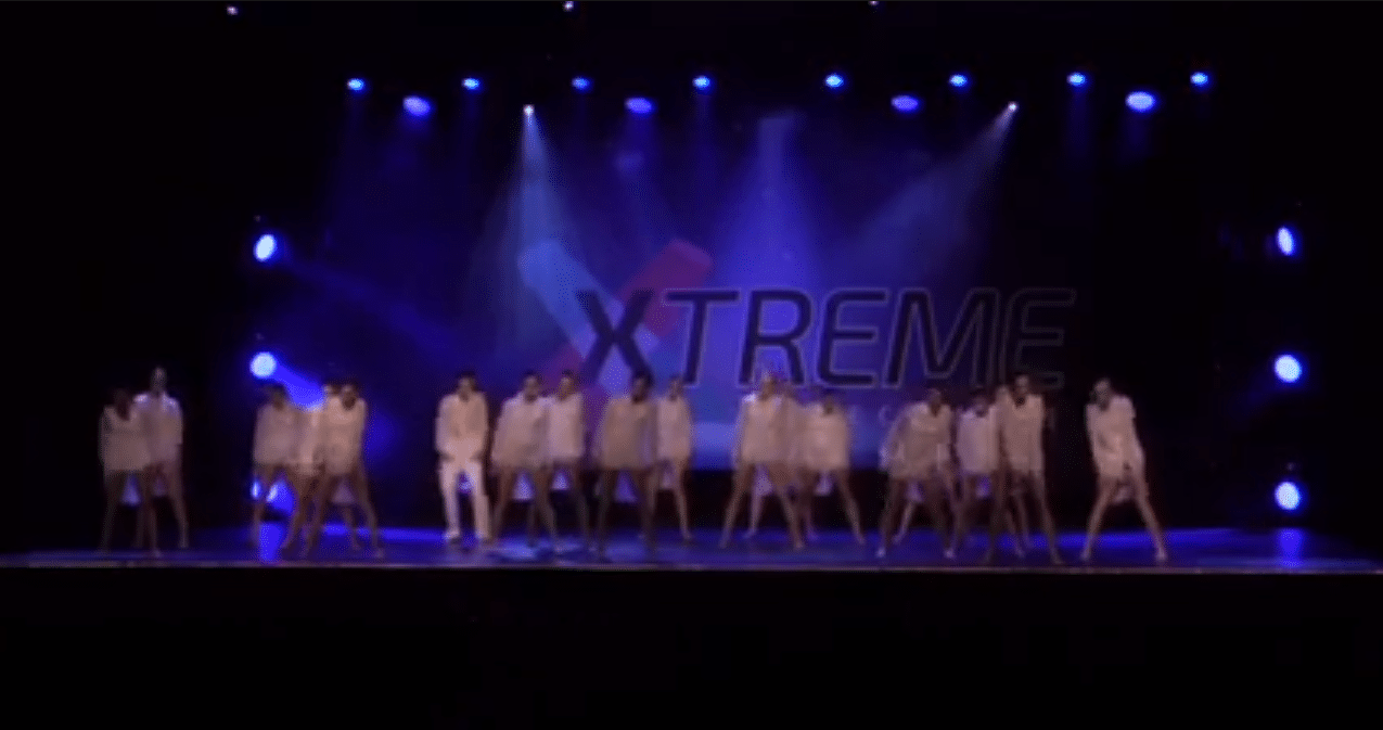 Competitive contemporary dance team on stage at dance competition in richmond hill